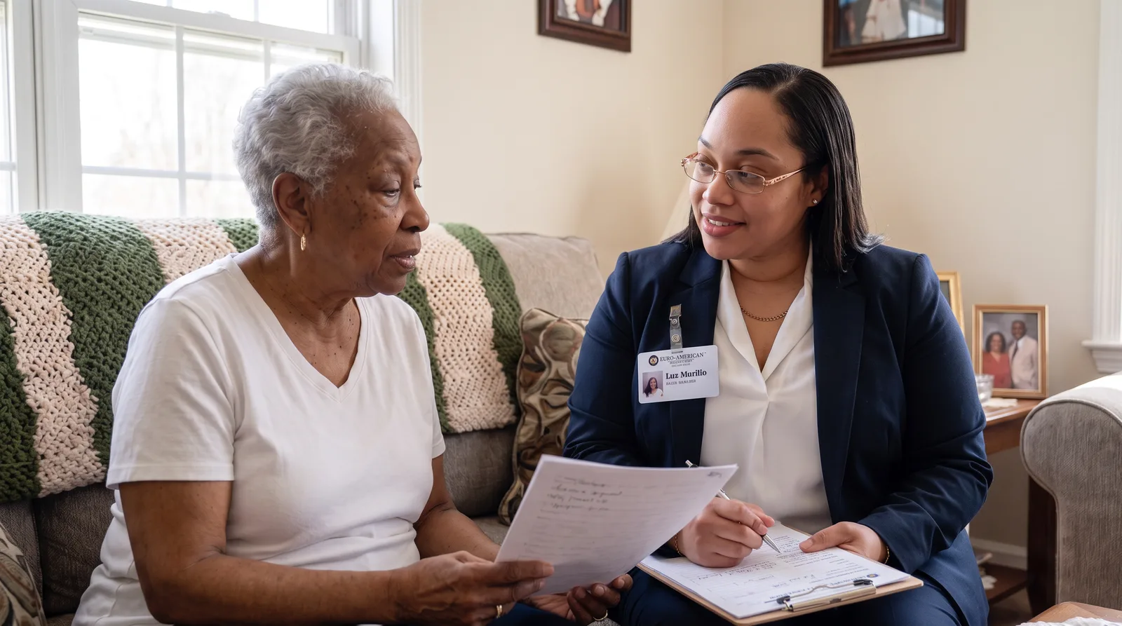 A field supervisor visiting a client at home